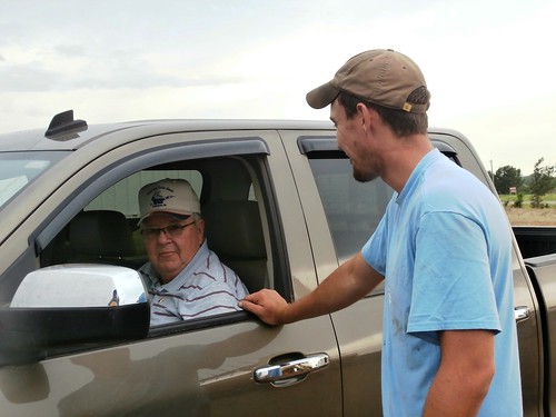 Neal and Brandon talking harvest business