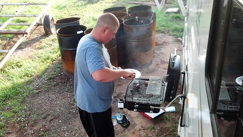 Matt cooking at the camper