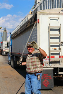 Dad gives a wave while he untarps!