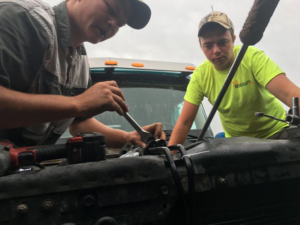 HPH - Charel and Henry doing some repair work. (From Mark)