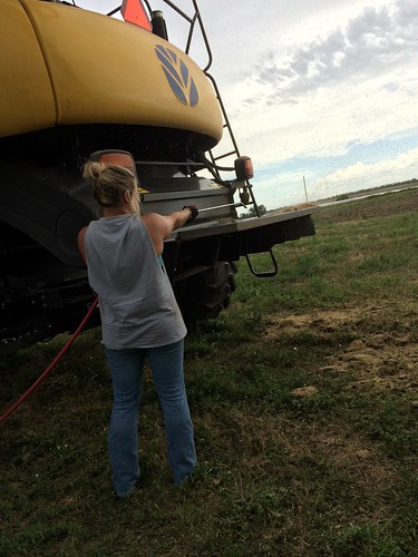 Cleaning off the combines for the trip north.