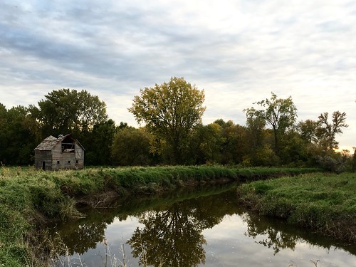 A cute little barn by the river.