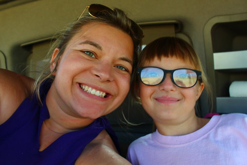 Steph and Breanna. I showed her this photo and after and asked if she wanted me to retake it since there was glare on her glasses. She says to me, "no thank you, it's a good photo."