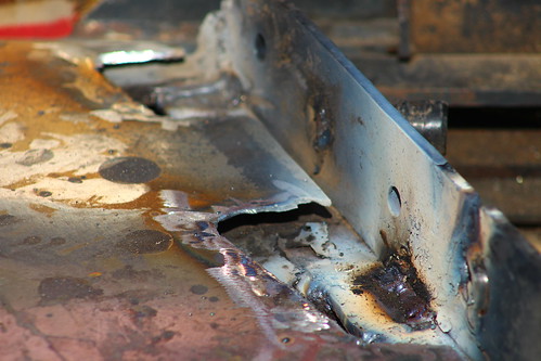 Welding up the frame underneath the center belt on the header.