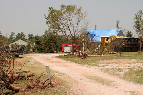 A train was overturned and a roof temporarily patched.