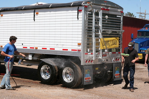 Oak and James washing trucks.