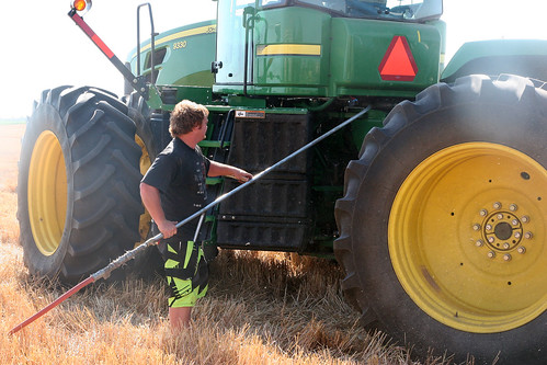 Johan blows off the tractor.