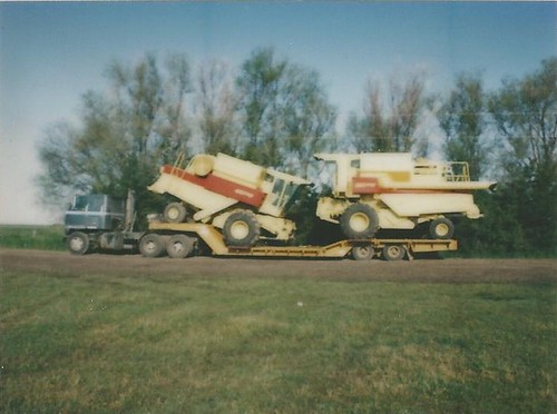 Old combines loaded up