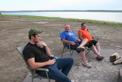 James Dad and Damon chat by the fire