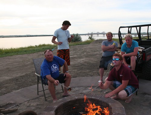 Dad, Oak, and Callum make toasted marshmallows.