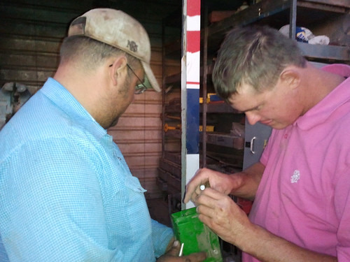 Damon and Leon intent on fixing the header.