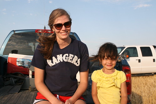 Kelly and Kaidence hanging out on the tailgate