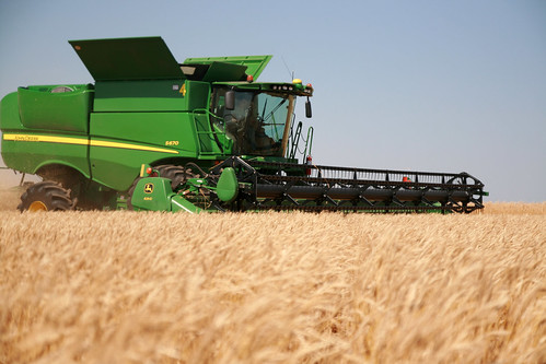 Jonny works on cutting our first field in Kiowa