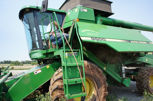 Vincent cleaning blowing out the combine