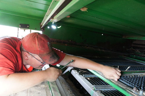 August taking bolts off to clean the sieves