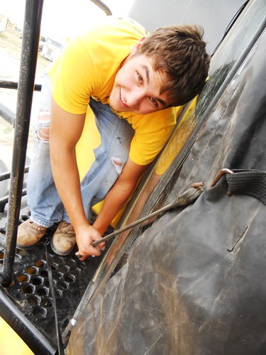 Jose putting on windshield cover