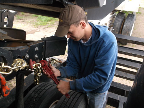 Brandon checks a chain binder