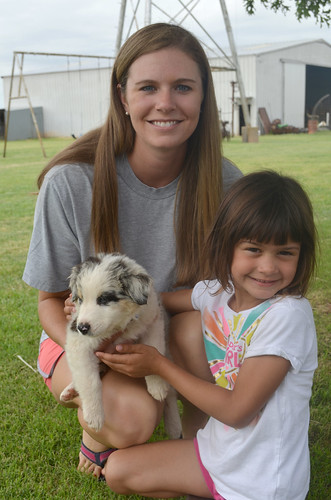 Kaidence and Kelly hold Willy the newest Campbell addition