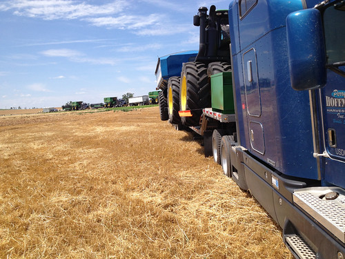 If you look at the grain cart you will see it almost fell off the trailer