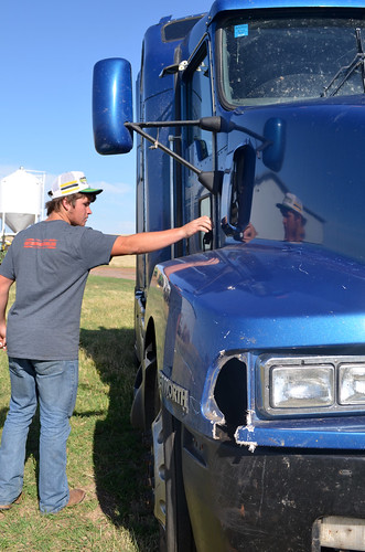 Frank checks out with the damage on the passenger side of the vehicle