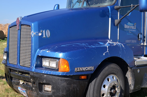 Fence damage done to the side of the truck