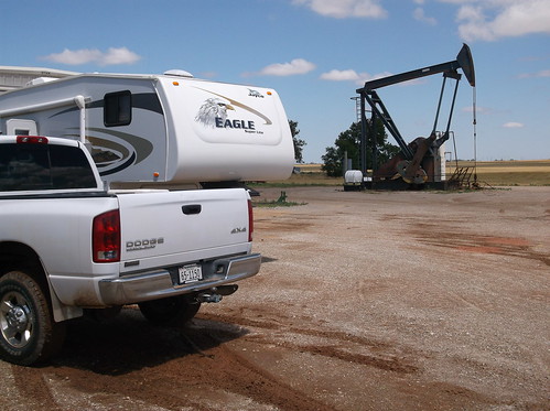 Camper by an oil well