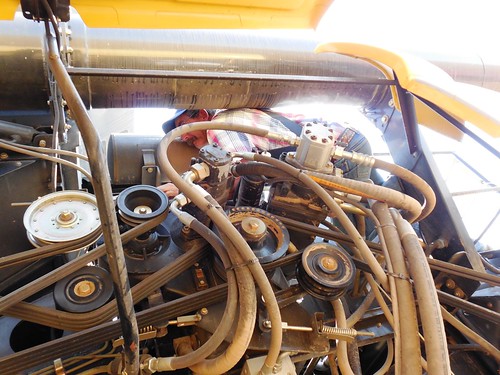 Dad fixing a hydraulic hose