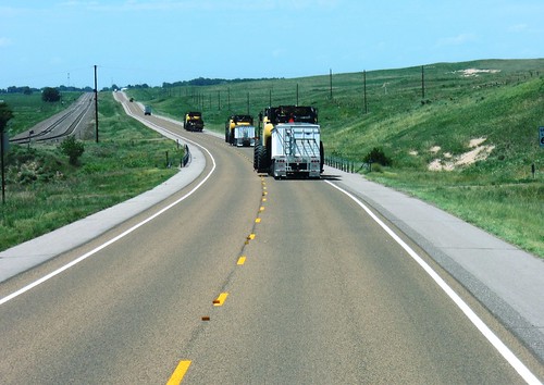 The convoy moving through the sandhills