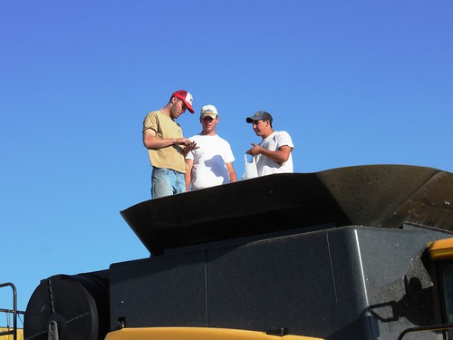 Graham, Kyle, and Jose checking a sample