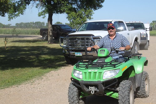 Dad cruising around the farm.