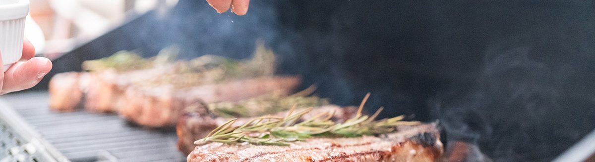 Grilling steak. (Adobe Stock │ #297395181 - arinahabich)