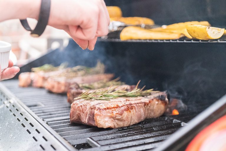 Grilling steak. (Adobe Stock │ #297395181 - arinahabich)