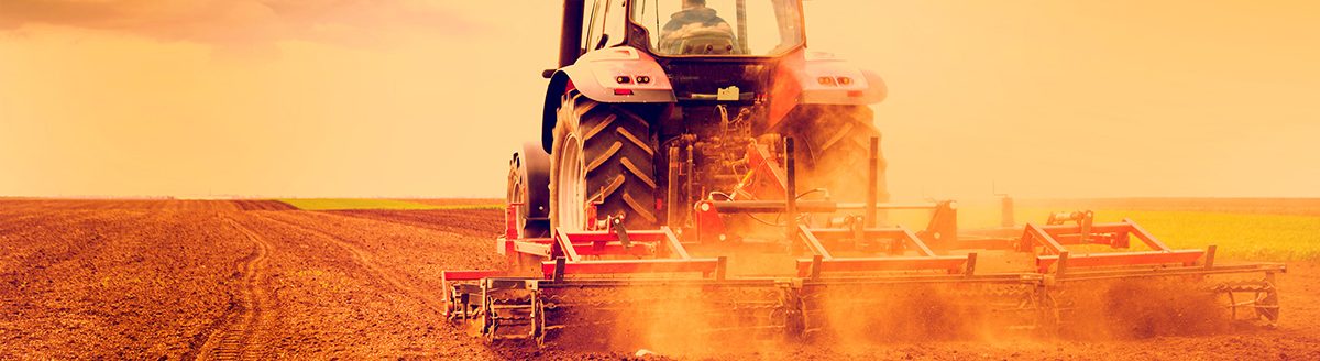 Farmer in tractor preparing land for sowing. (Adobe Stock │ #68259903 - oticki)