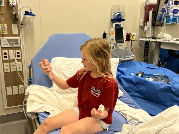 Zoey at the Emergency Room in Tribune, Kansas. She was a trooper, and handled the experience much better than I. 