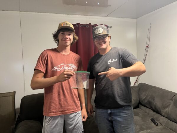 Drake and Reagan with their rattler and the first rattler Patrick got.