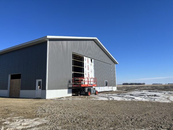 The hydraulic door is finally getting some tin. 