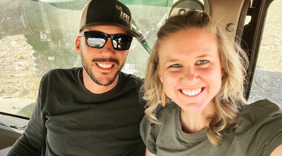 Ryan and Laura together in the tractor during fall harvest.