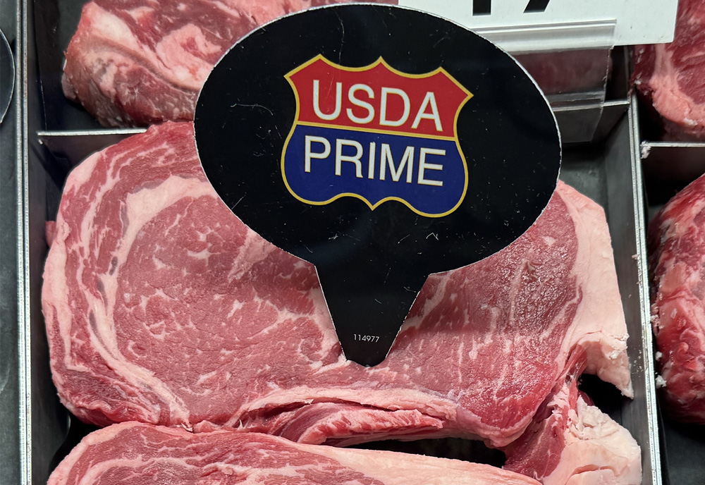 Ribeyes graded as "prime" in the grocery butcher case. Taken May 3, 2025. (U of A System Division of Agriculture photo.)