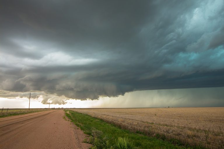 A wall cloud forms underneath a tornadic supercell thunderstorm as it gathers strength. (Adobe Stock │ #157359268 - Dan Ross)