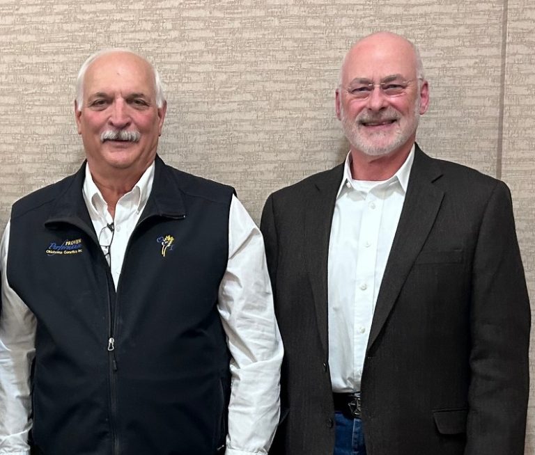 From left, Mark Hodges and Bradford "Brad" Seabourn were recognized for their vision and leadership by Plains Grains Inc. (Courtesy photo.)
