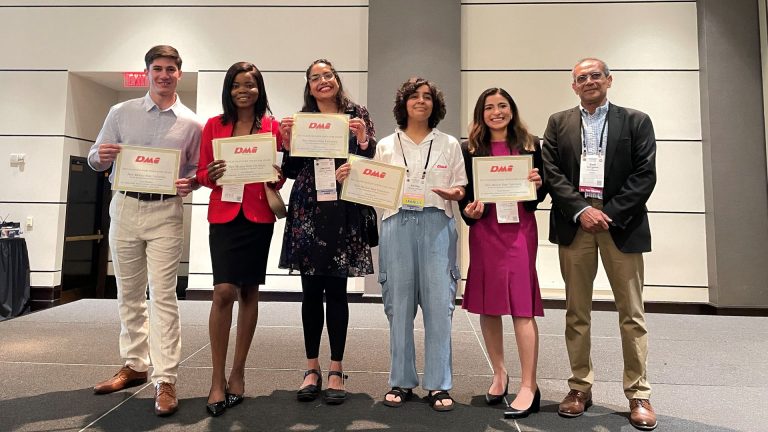 New Mexico State University students Alejandro Schutte, from left, Joy Agbawodike, Jazmine Arreola, Ashley Medina Cardona and Andrea Soler received the Platinum Dairy Innovator Award at the American Dairy Science Association annual meeting in Louisville, Kentucky. (NMSU photo)