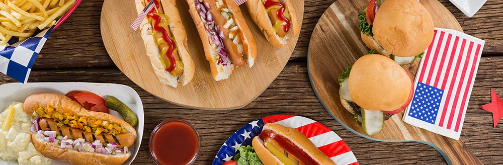 Hot dogs on a table during the 4th of July. (Adobe Stock │ #184418960 - wavebreak3)