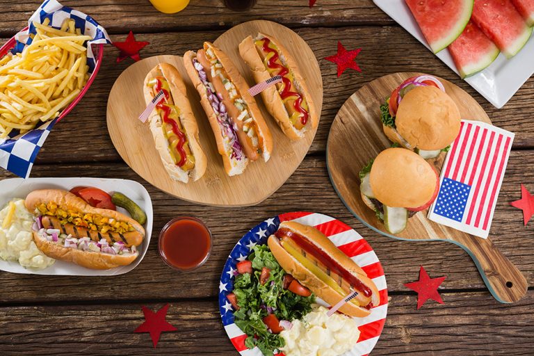 Hot dogs on a table during the 4th of July. (Adobe Stock │ #184418960 - wavebreak3)