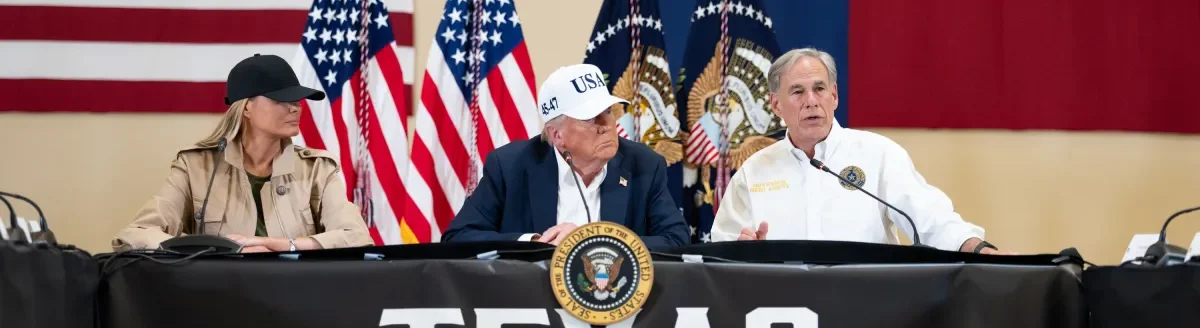 From left, First Lady Melania Trump and President Donald Trump listen as Texas Gov. Greg Abbott speaks. (Photo courtesy of White House.)