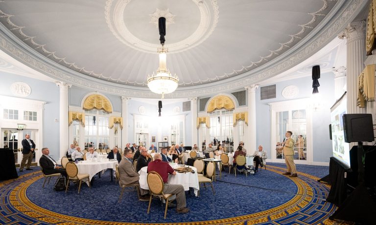 Pictured above in the courtesy photo is the U.S. Grains Council's 65th Annual Board of Delegates meeting at the historic Amway Grand Plaza Hotel in Grand Rapids, Michigan, on Aug. 1, including a slate of expert speakers and opportunities for members to contribute to the Council's global marketing strategies. In the picture, USGC Deputy Regional Director for Southeast Asia and Oceania Chris Markey (right most) updates members of the Council's Asia Advisory Team about trade policy developments in the region.