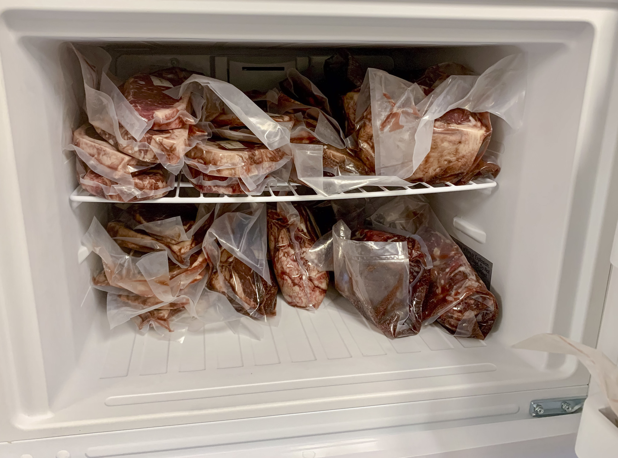 Frozen meat-freezer Frozen meat in vacuum-sealed packs were part of a meat science study investigating freezing method and portion size. (U of A System Division of Agriculture photo)