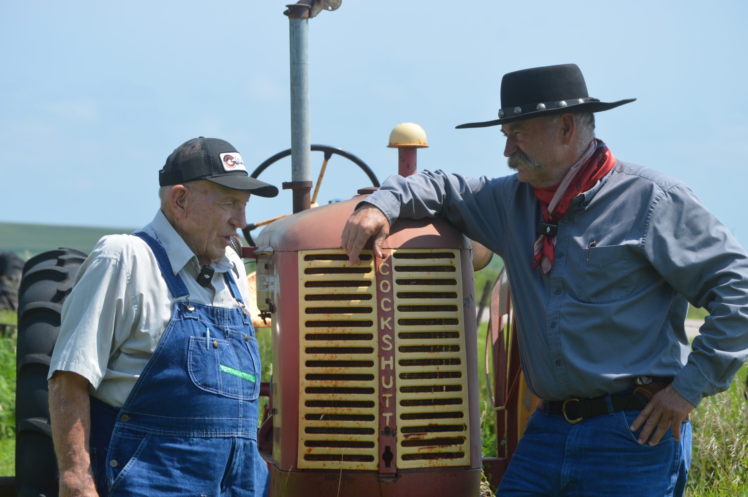 (Left) Don Kubik discusses Cockshutt tractors with Trent Loos. (Courtesy photo.)