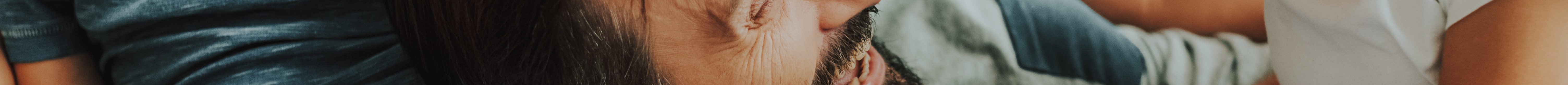 Happy parents and two kids having fun together. (Adobe Stock │ #245635985 - Yakobchuk Olena)