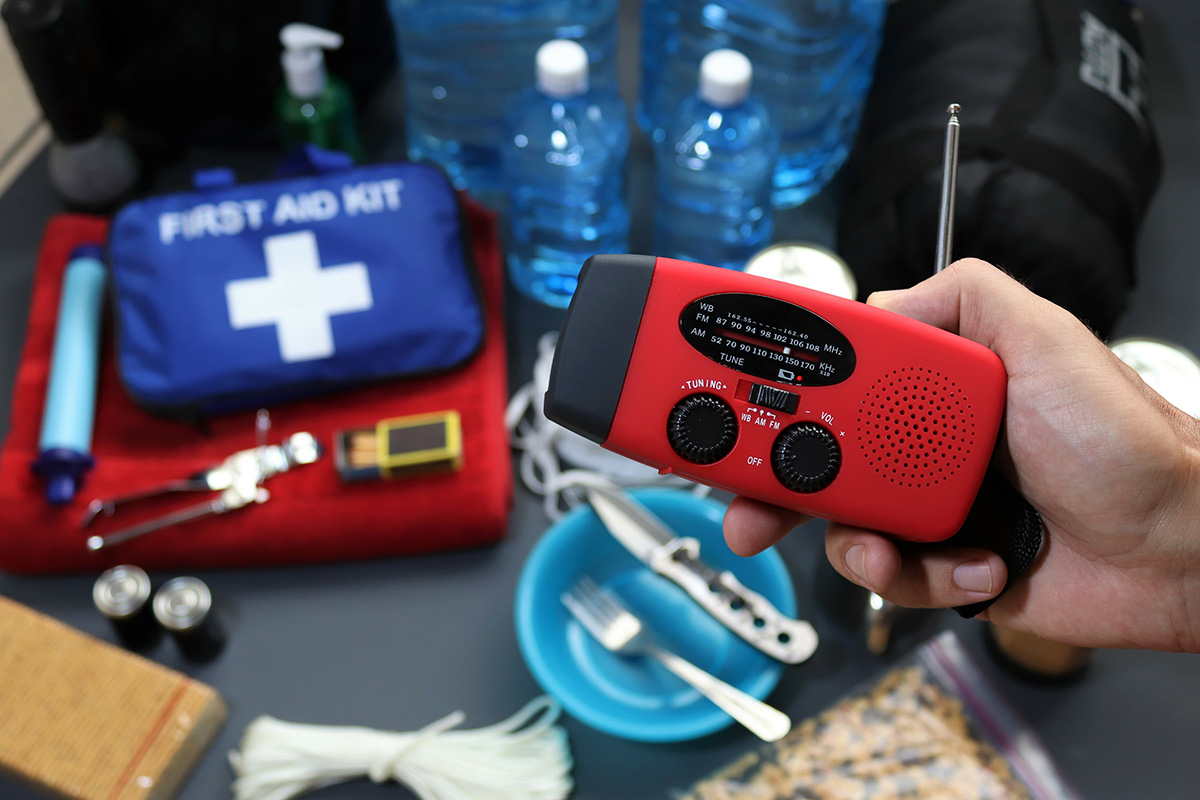 Disaster management includes preparing a disaster kit that can be contained in a go bag. These items should include a first aid kit, food, water, flashlight, radio, and sleeping bag. (Adobe Stock │ #338907885 - SpeedShutter)