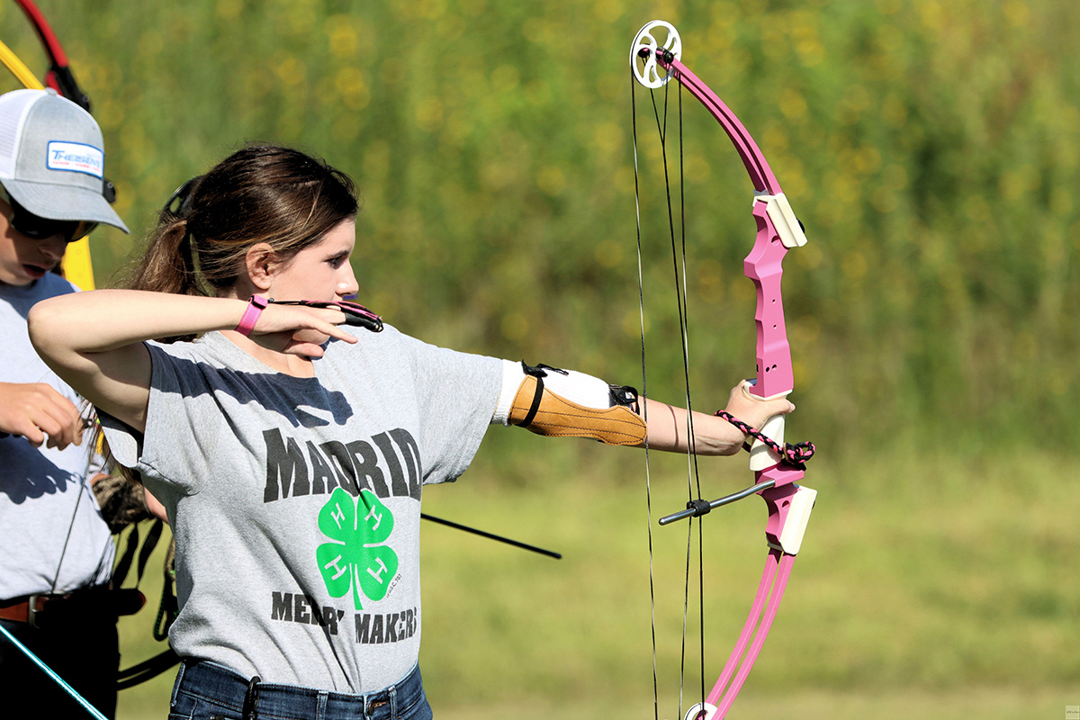 Morgan Christensen, 4-H SESS ambassador, competes in archery during the 2025 State 4-H Shooting Sports Match. (Photo courtesy of Michael Kloth)